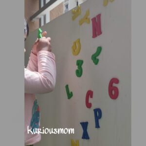 vertical play activity, fine motor skill, alphabet