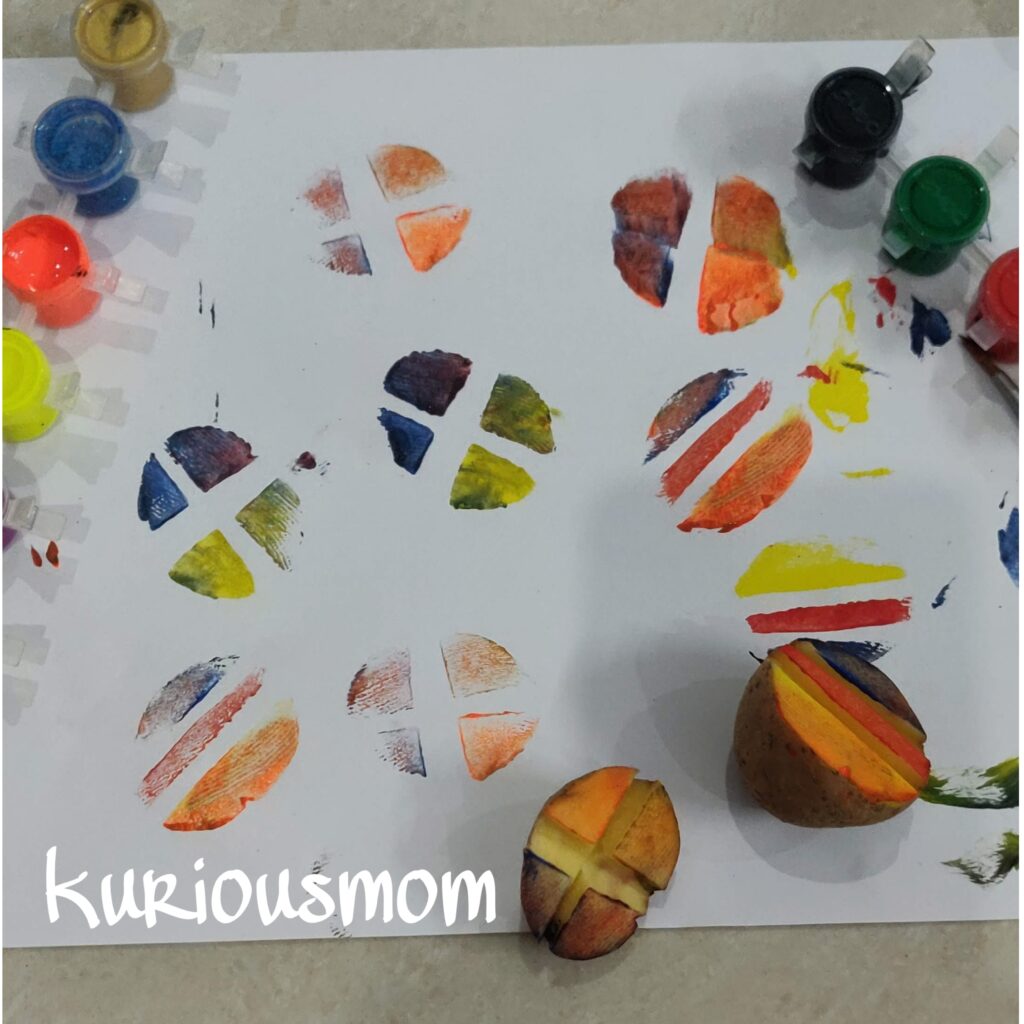 fine motor skill, painting, stamping with potato, preschool activity